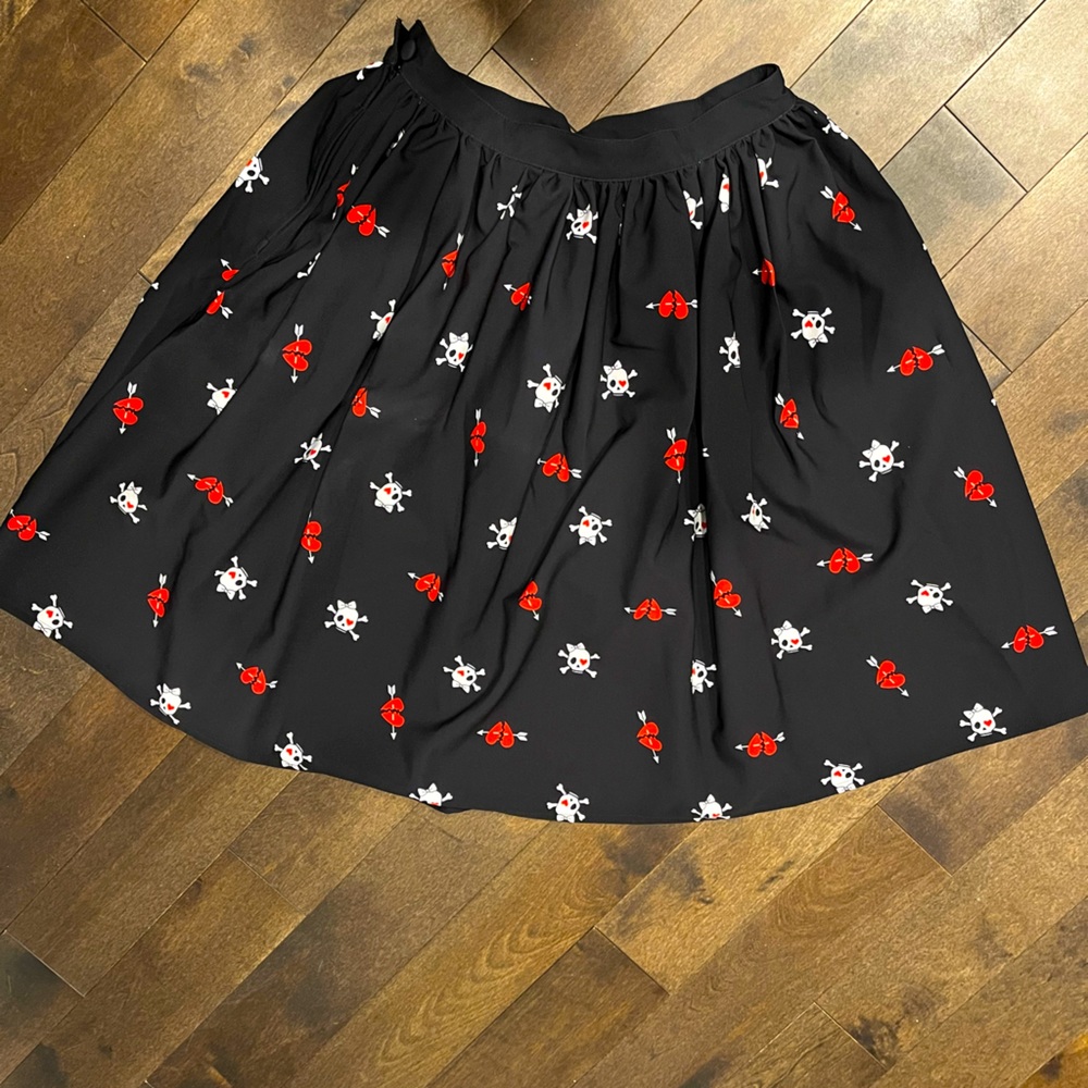 Pleated skull skirt